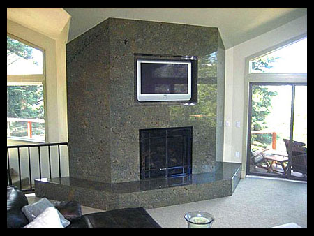 Custom granite and marble fireplaces.